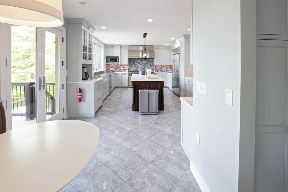Step into our bright and spacious gourmet kitchen, a chef's dream with an open layout and plenty of room to create.