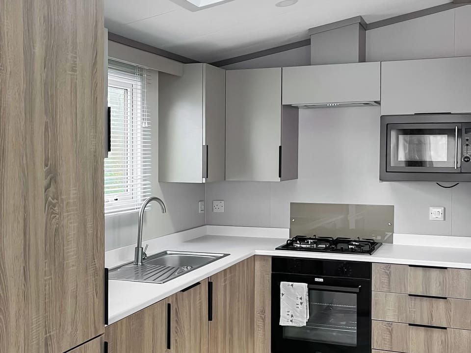 Open plan living space | Katie&rsquo;s Cosy Caravan - Shepherds Holidays, Kilmallieu