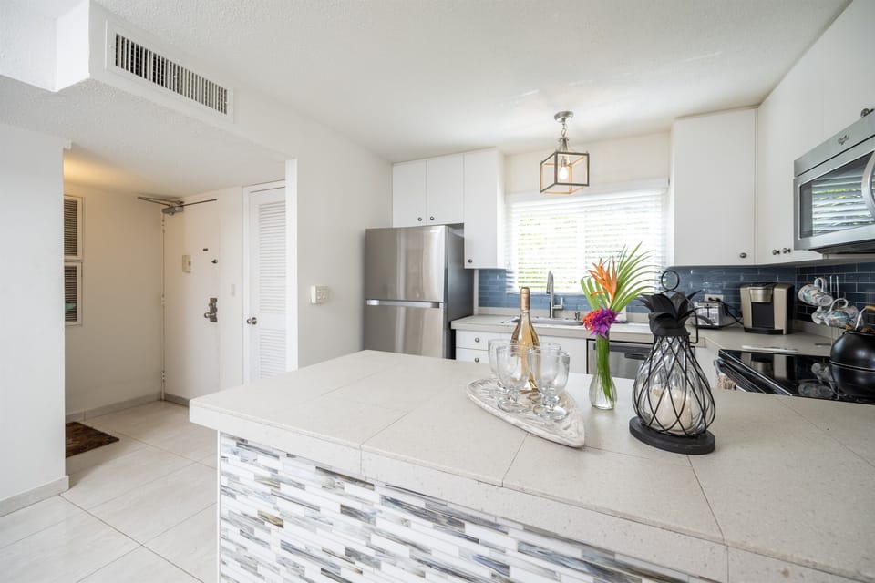 Enter this bright and newly renovated condo and get ready for relaxation!