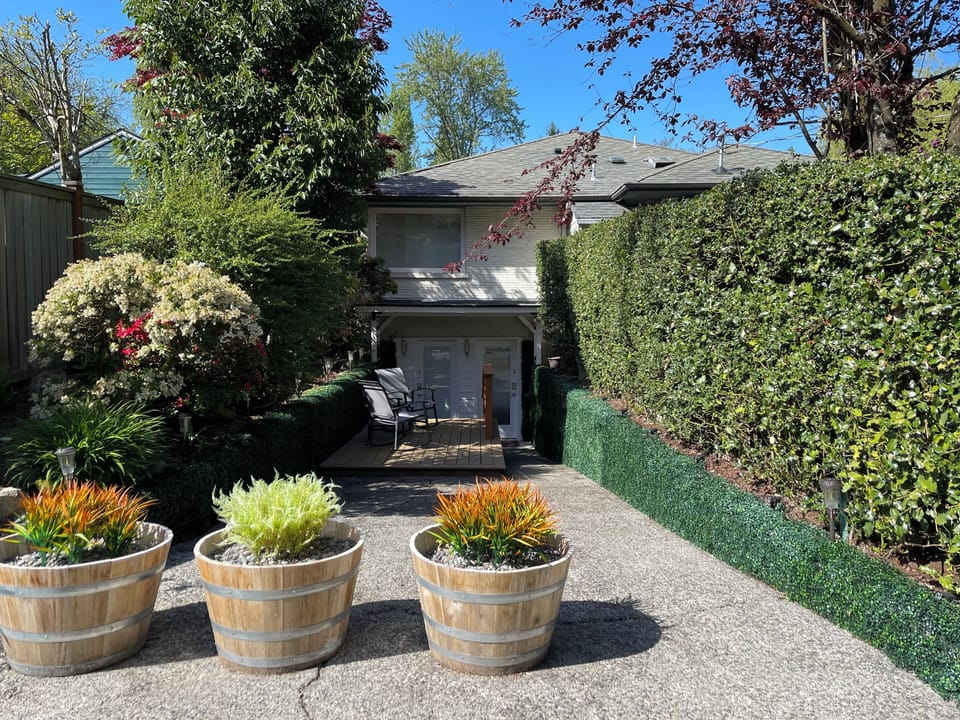 Guests entry driveway is around the corner and toward the back of the house 