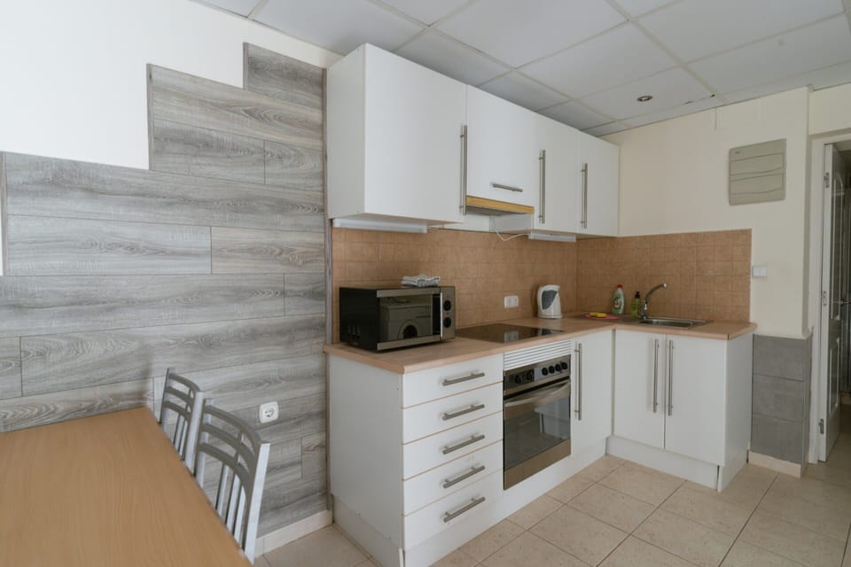 Villa | Private kitchen | Fridge, microwave, oven, dishwasher