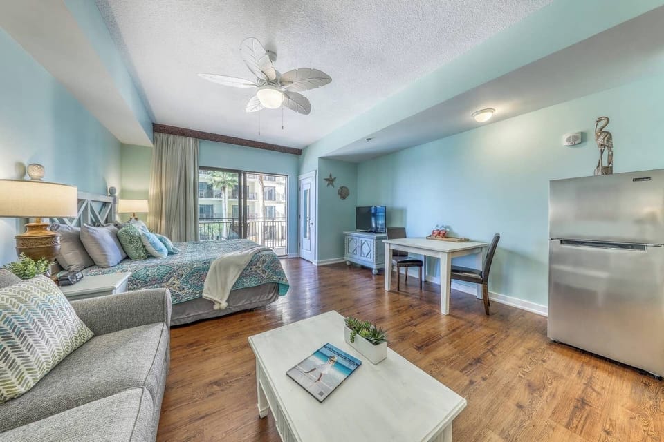 Larger fridge and dining space that also doubles as an office space when you need it!