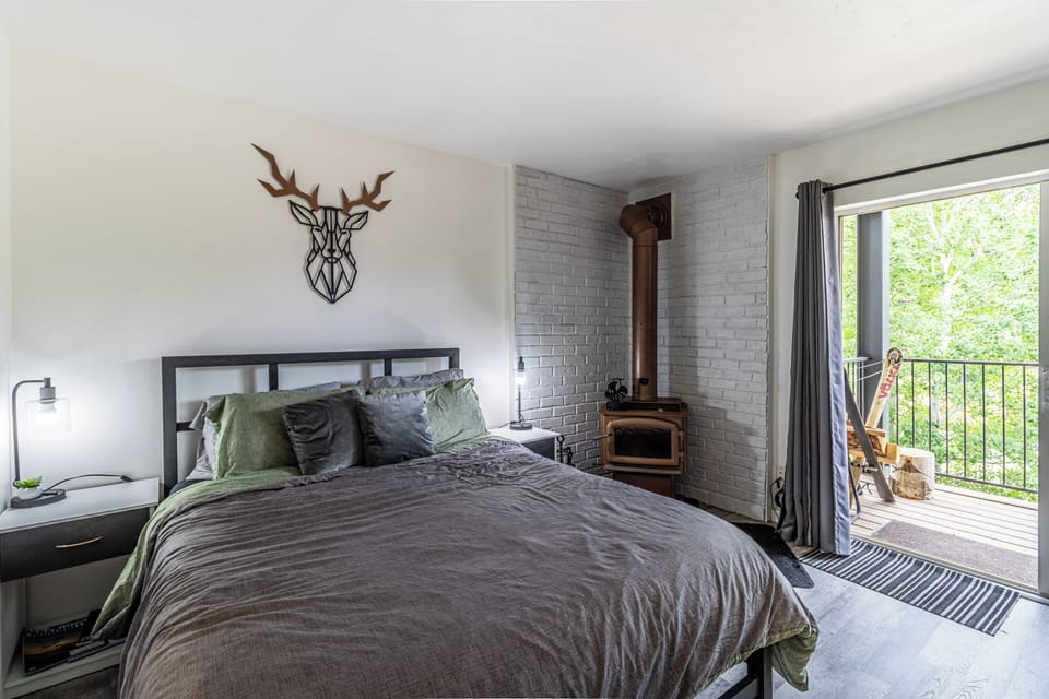 Double Bed, Fireplace, Sliding Doors to Balcony