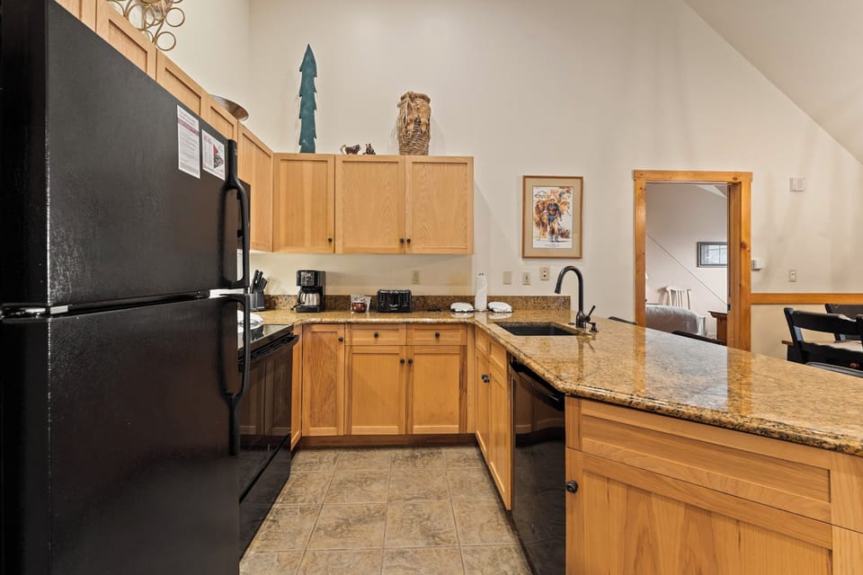 Your fully equipped kitchen features granite countertops, quality appliances, and everything you need to create memorable meals during your stay.