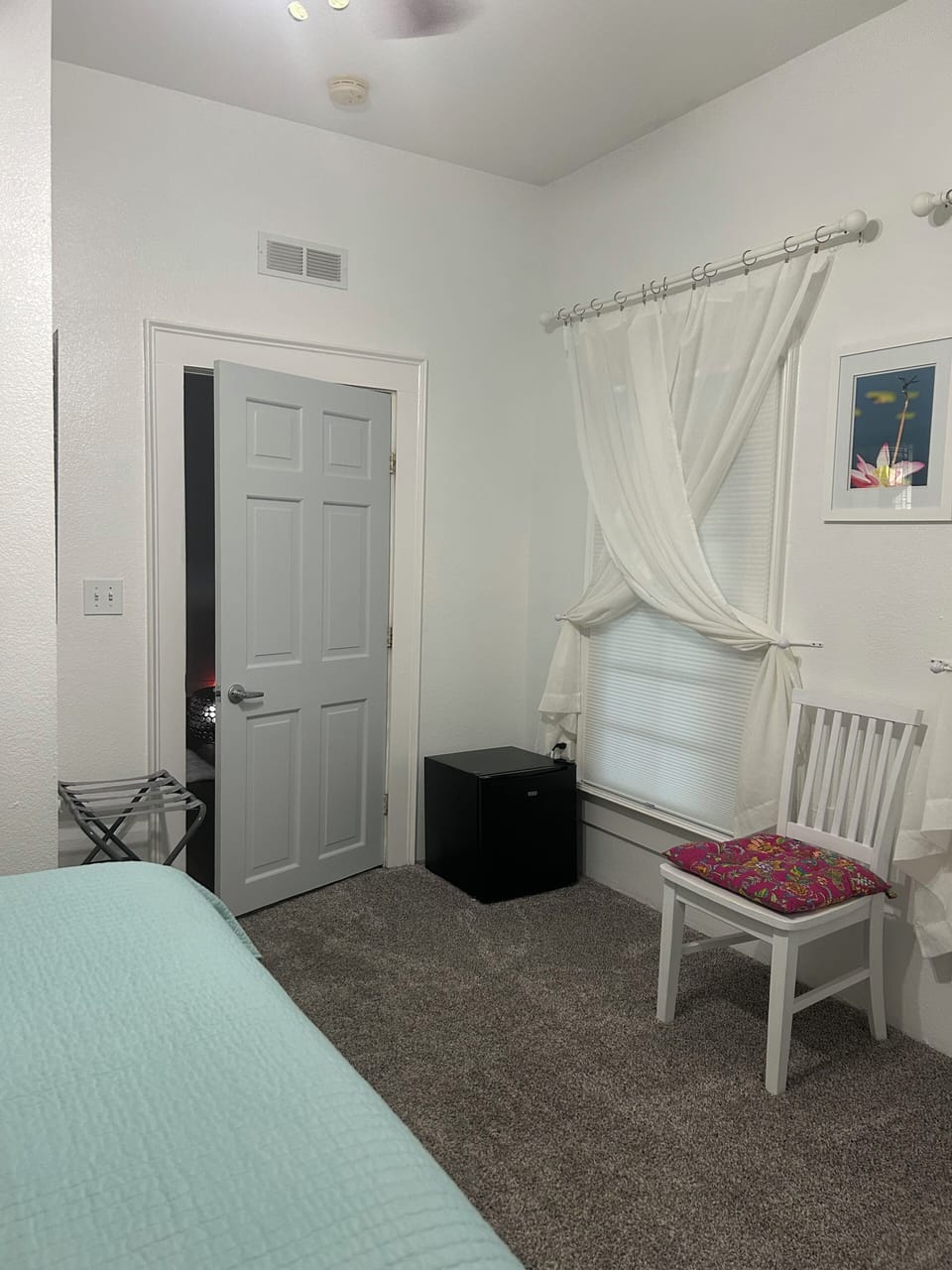 Bedroom Bathroom Ensuite — Queen Bed, Mini Fridge, Closet, Chair 