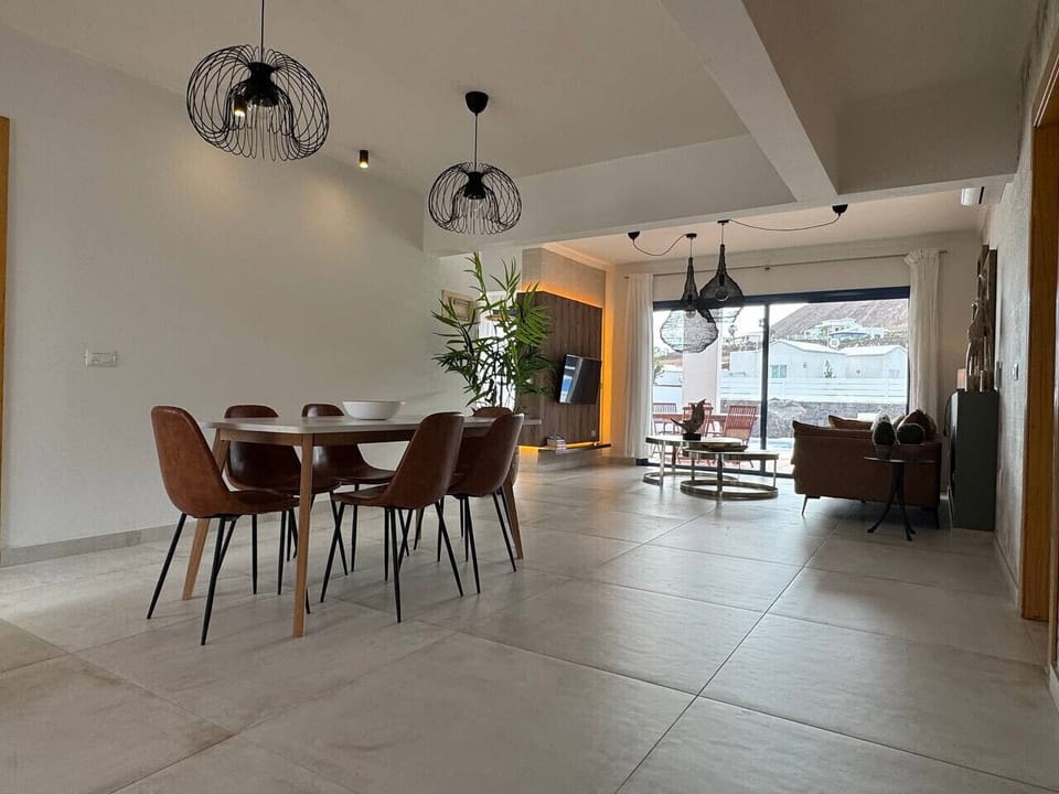 Open plan modern living and dining space.