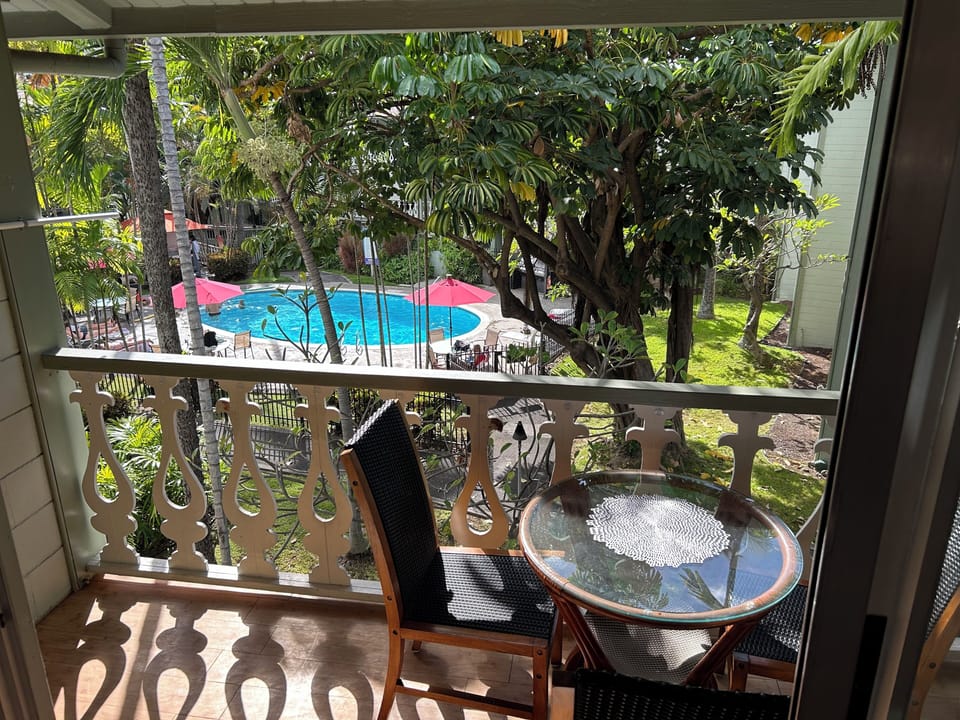 Lanai with table & chairs with view