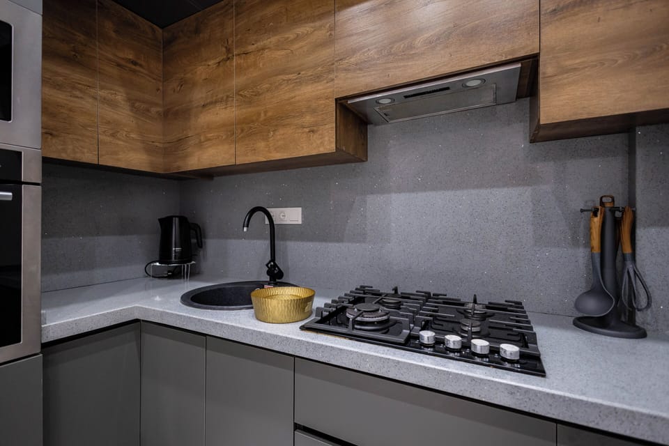 Family Condo, City View | Private kitchen | Stovetop, electric kettle