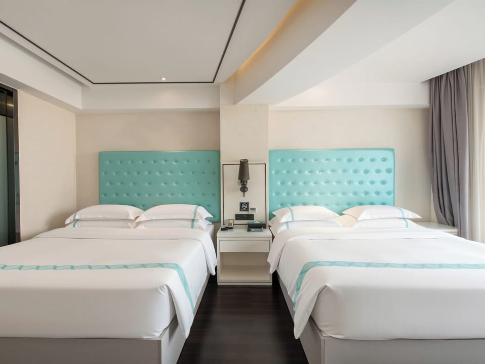 Business Twin Room, City View | Hypo-allergenic bedding available, down comforters, Select Comfort beds