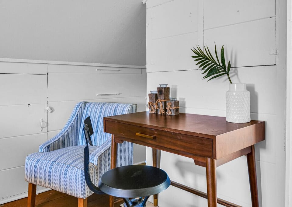 Work from College Town Cottage using the desk space in the attic bedroom.