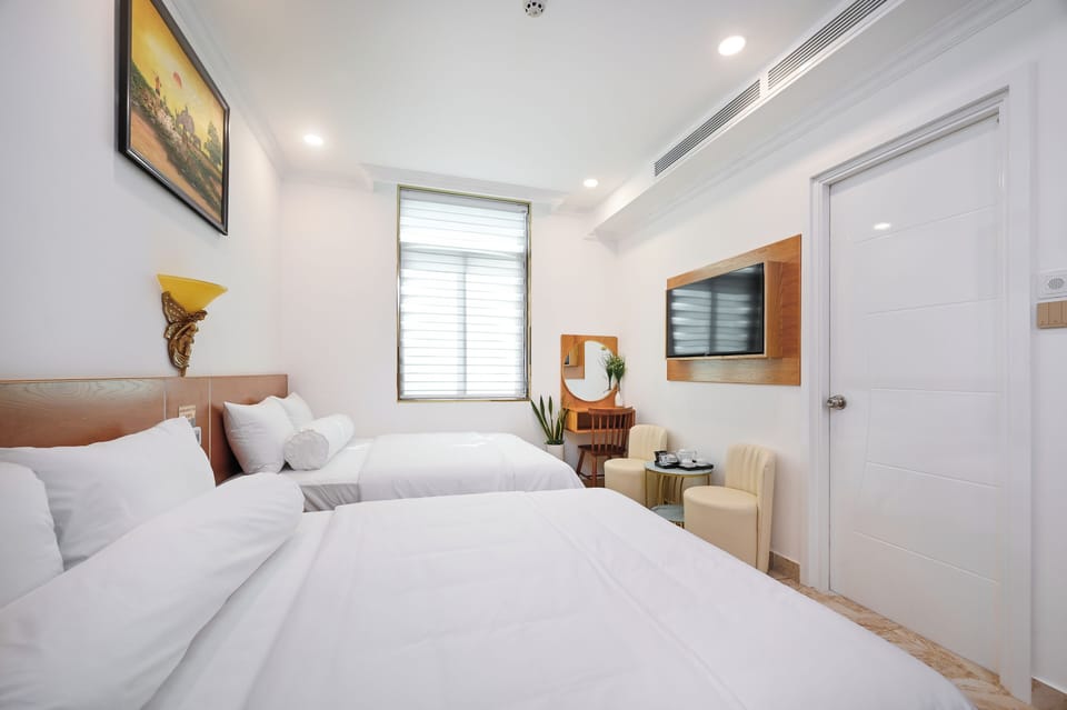 Deluxe Quadruple Room, Bathtub | Minibar, desk, laptop workspace, iron/ironing board (on request)