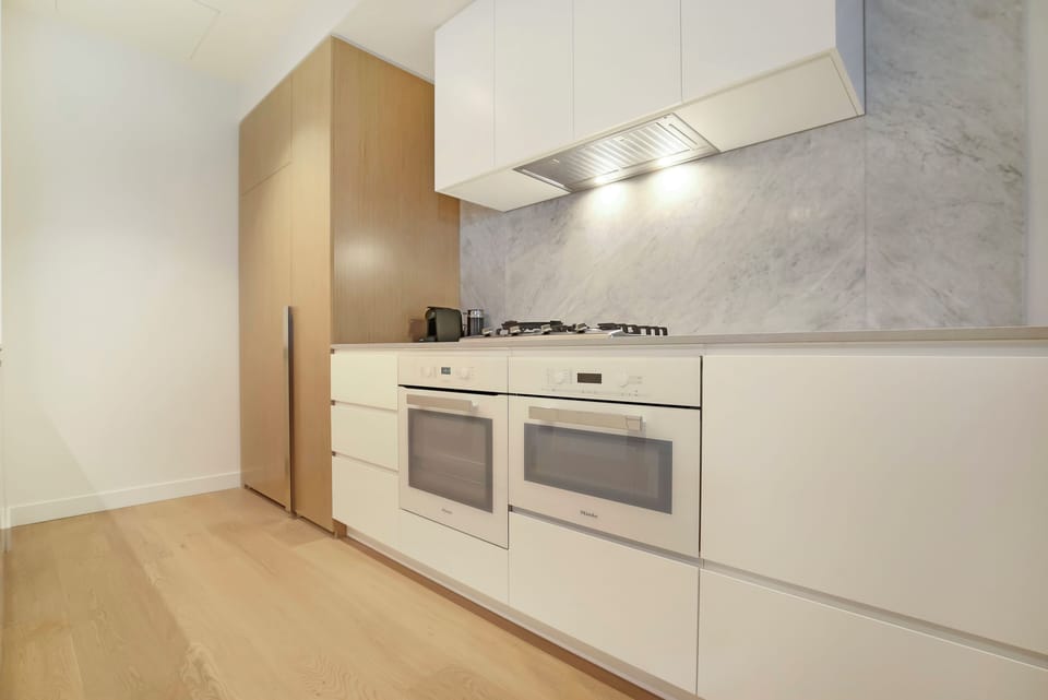 Apartment, Balcony, City View | Private kitchen | Full-size fridge, microwave, oven, stovetop