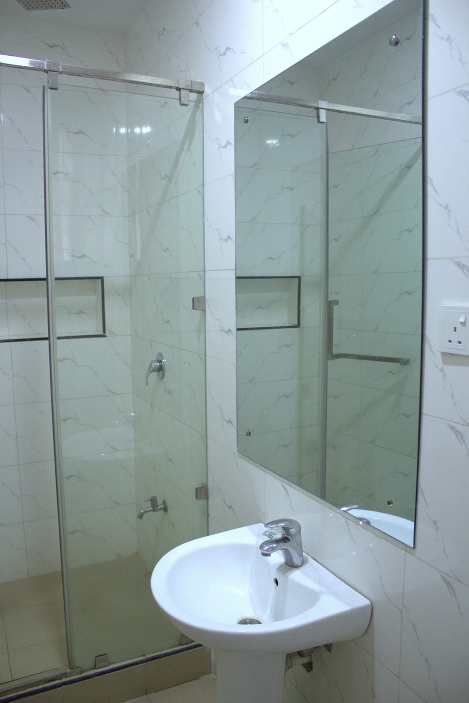 Shower, towels, toilet paper
