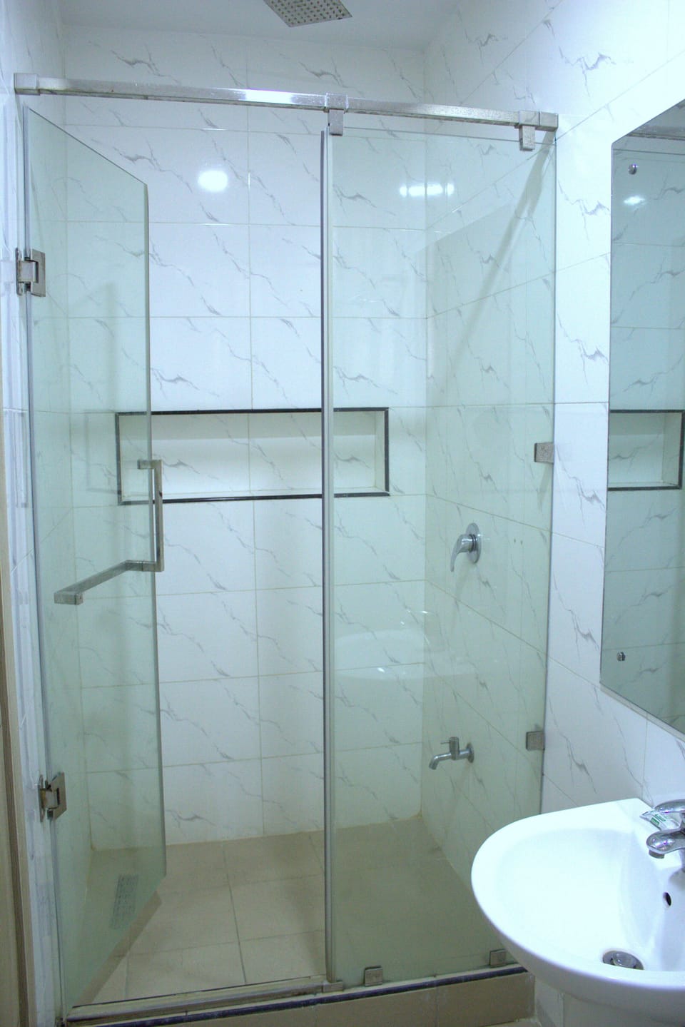 Executive Suite | Bathroom | Shower, towels, toilet paper