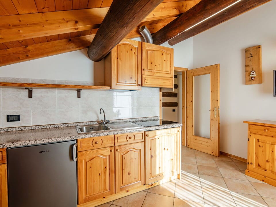 Wood, Flooring, Interior Design, Cabinetry, Ceiling, Floor, Kitchen, Home, Countertop, Furniture