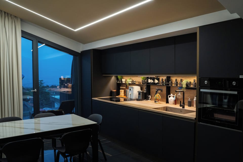 Superior Studio Suite, City View | Laptop workspace, blackout drapes, soundproofing, iron/ironing board