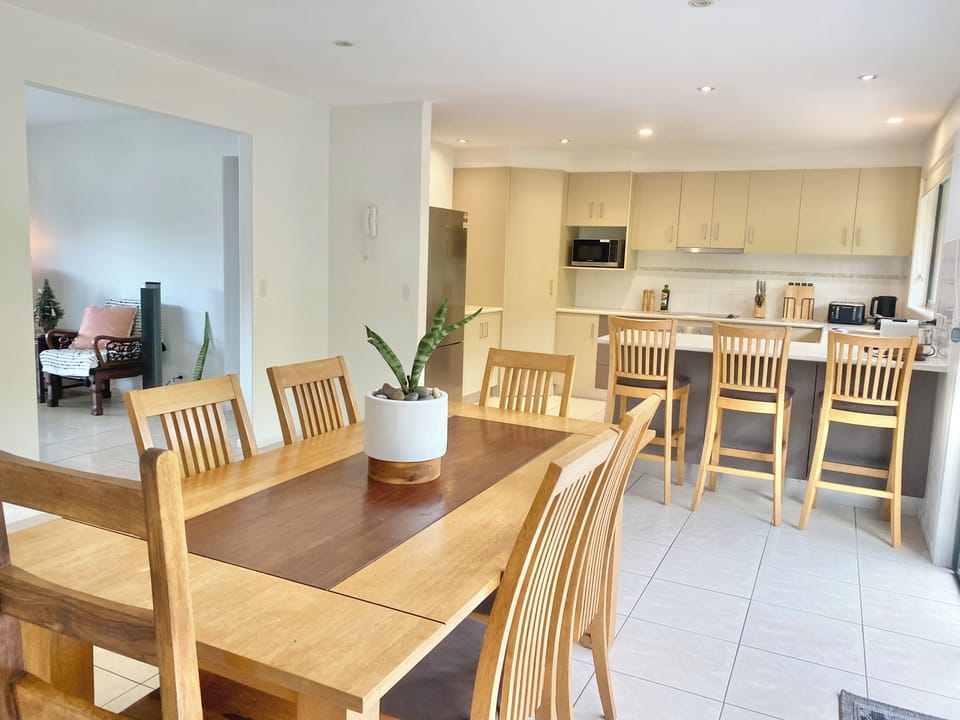 Dining room that leads out to the back patio with two burner gas BBQ