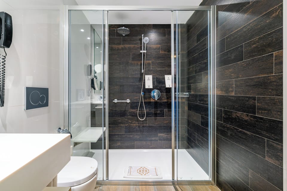 Eco-friendly toiletries, hair dryer, bathrobes, slippers