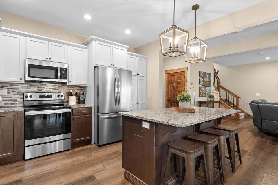 The cabinets are stocked with all the pots, pans, utensils, and small appliances you would need to cook up your favorites!