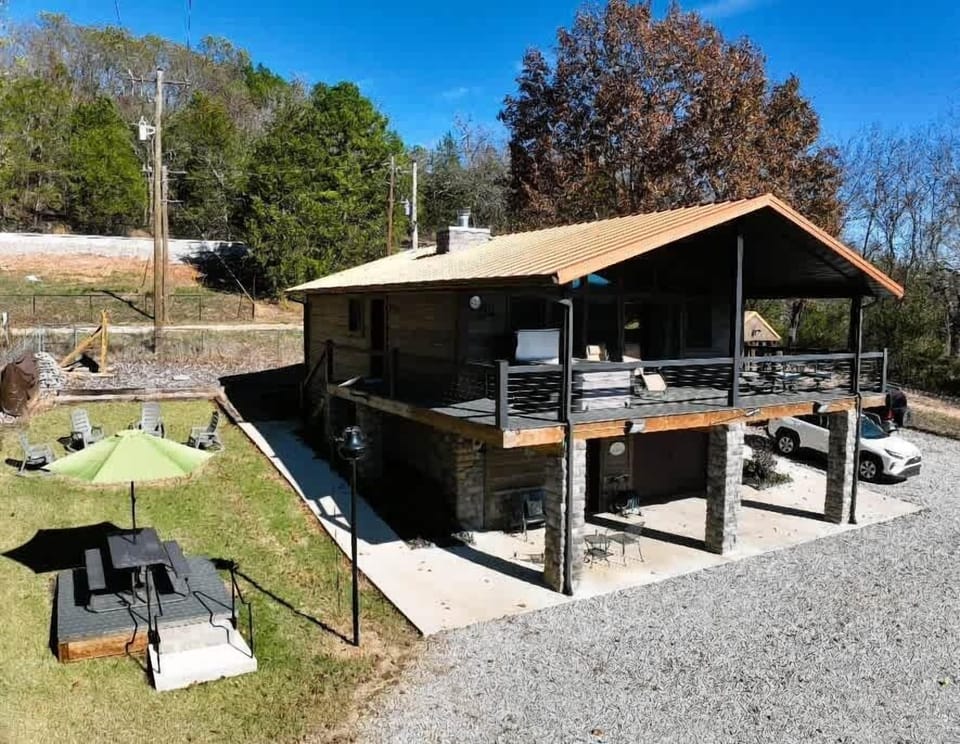 Outdoor Firepit (behind the umbrella)