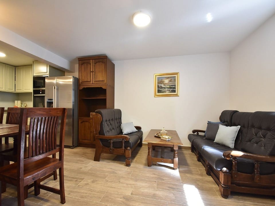 Apartment (One Bedroom Apartment) | Living room | 32-inch flat-screen TV with digital channels