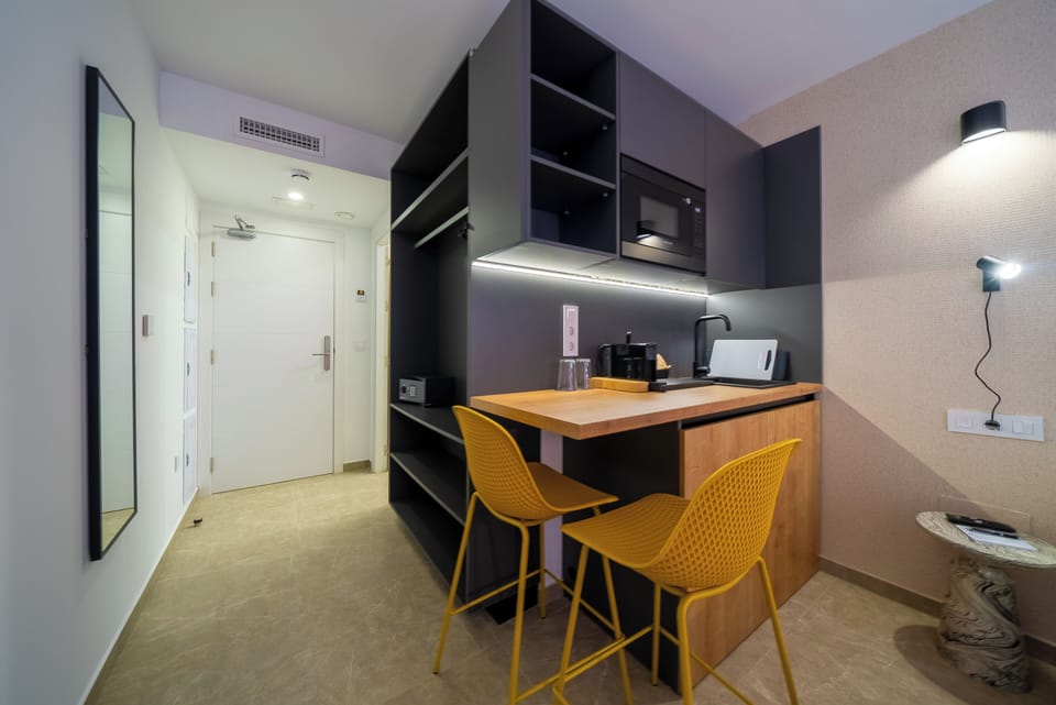Fridge, microwave, espresso maker, coffee/tea maker