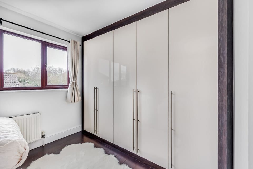 Bathroom with a walk in shower and bath. Complimentary toiletries are provided.