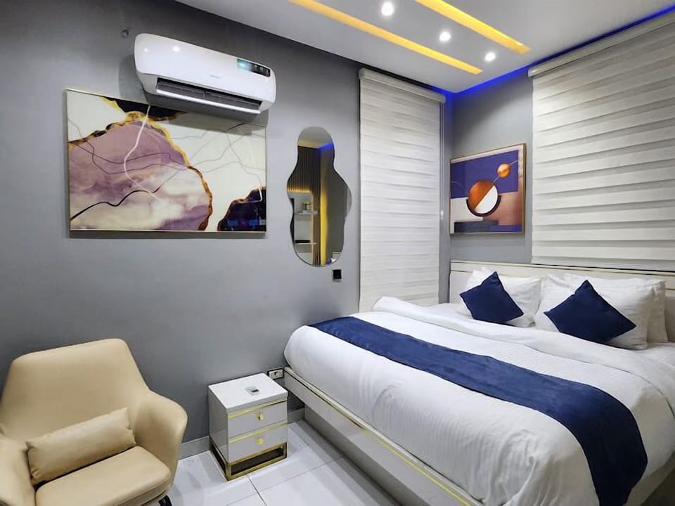 Deluxe Room, Balcony, City View | Desk, laptop workspace, free WiFi