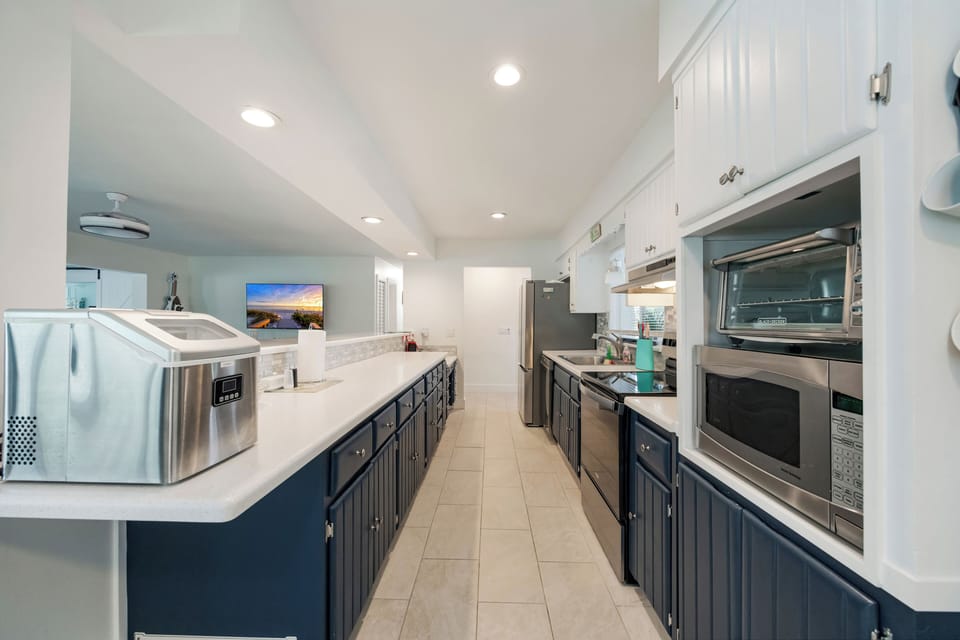 Updated kitchen w/stainless appliances and many added perks 