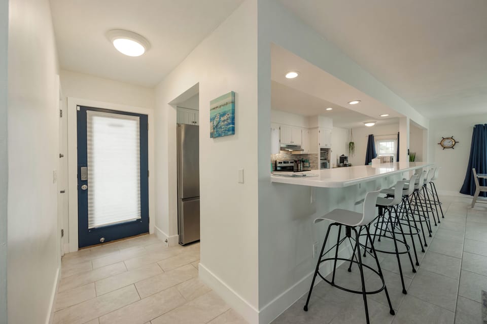 Entry way open concept kitchen and living space. 