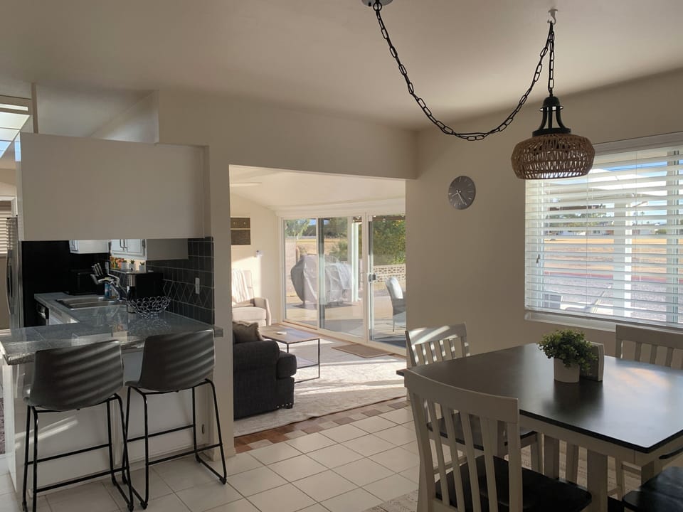 Dining room with glimpse into sun room