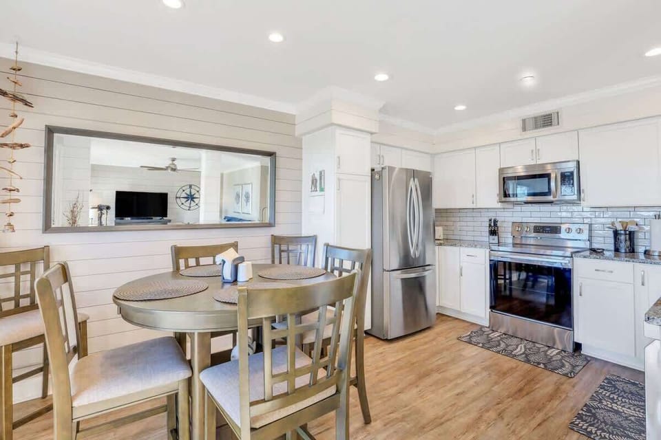 The heart of the house features a fully equipped gourmet kitchen.