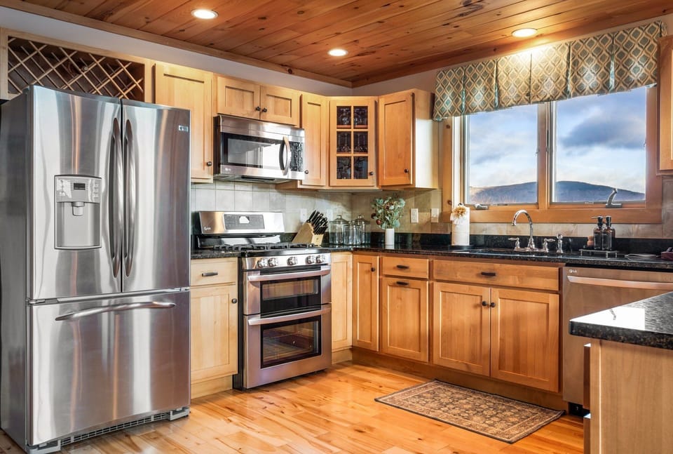 Cooking has never been so inviting—prepare and share your favorite dishes in this cozy space.