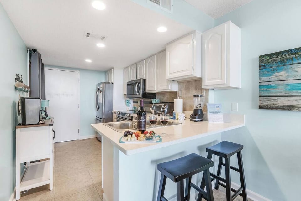 New stainless steal appliances and a pantry with plenty of room for all of your beach snacks! 