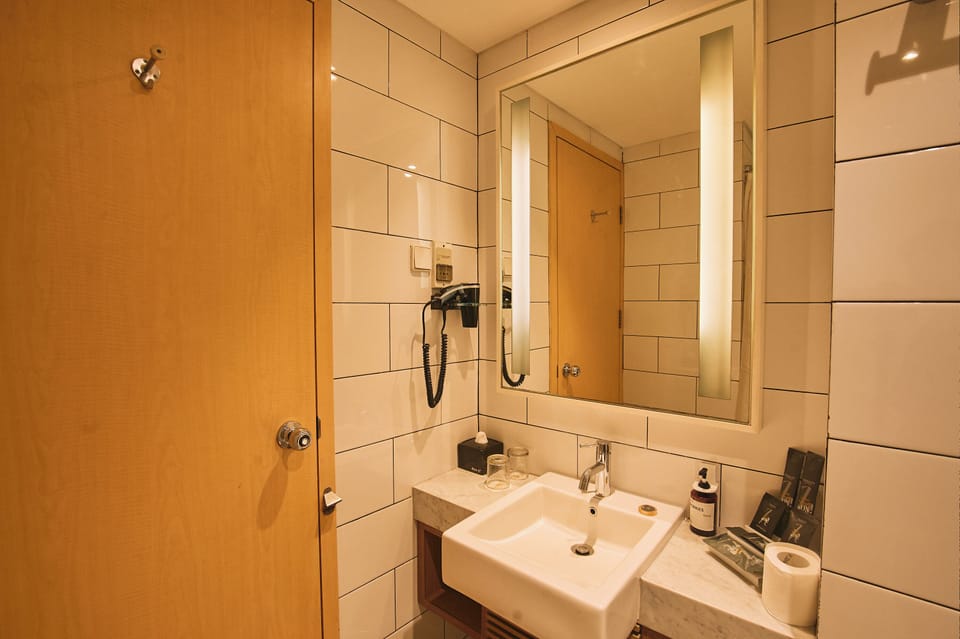 Shower, free toiletries, hair dryer, slippers