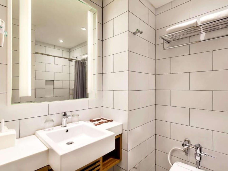 Shower, free toiletries, hair dryer, slippers