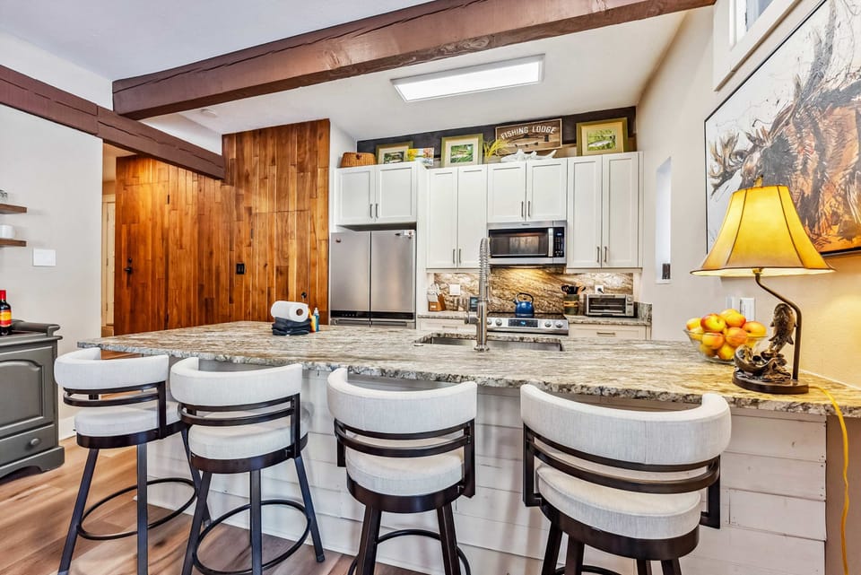 Kitchen: Well-equipped kitchen, updated appliances, drip coffee maker, Keurig, pantry, 4 bar stools  
