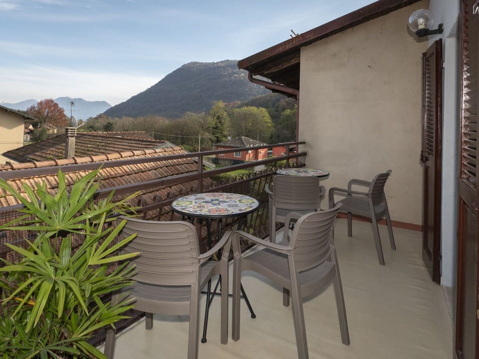 Plant, Table, Property, Furniture, Sky, Building, Flowerpot, Chair, Wood, Outdoor Furniture