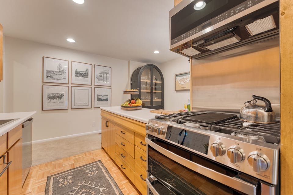 Stainless steel appliances in the kitchen.