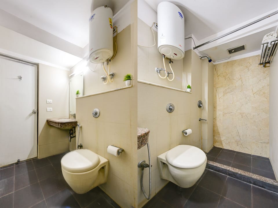 Double Room, City View | Bathroom | Shower, free toiletries, slippers, towels