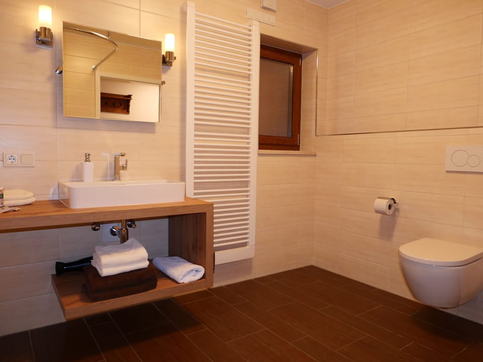 Premium Double Room, Sauna, Hill View | Bathroom | Shower, hair dryer, towels, soap