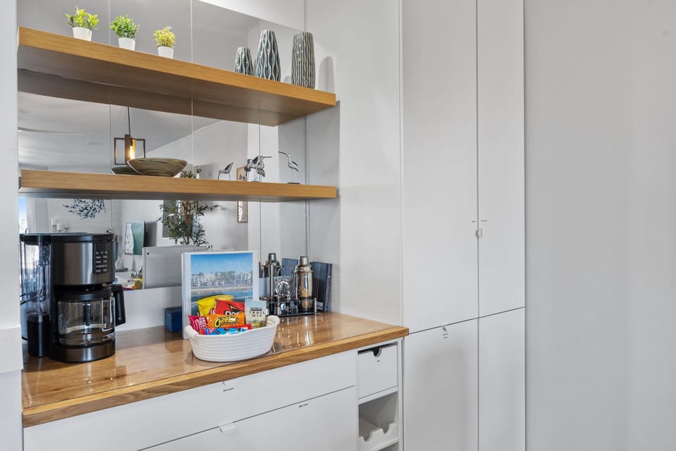 A station for coffee and cocktails to whip up your vacation drinks, complete with a wine rack