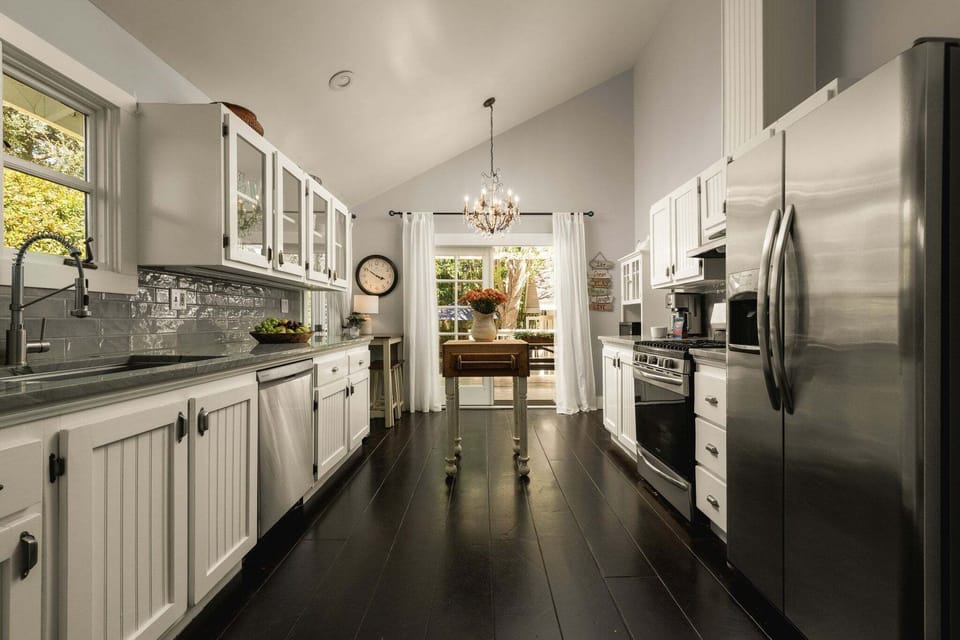 Galley style kitchen with plenty counter space and butcher block island
