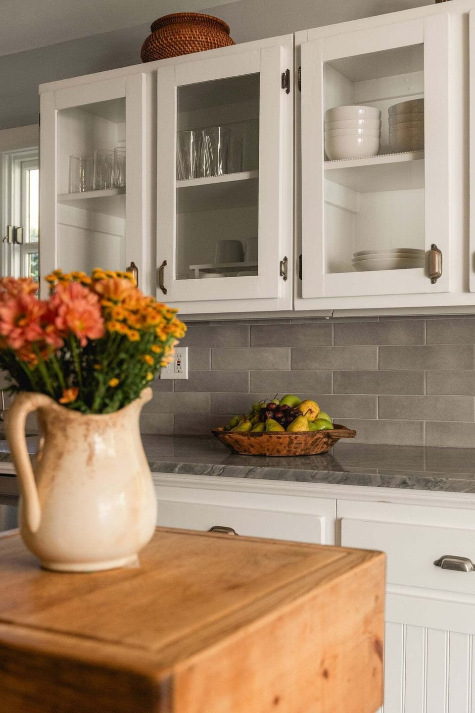 Spacious kitchen features butcher block island