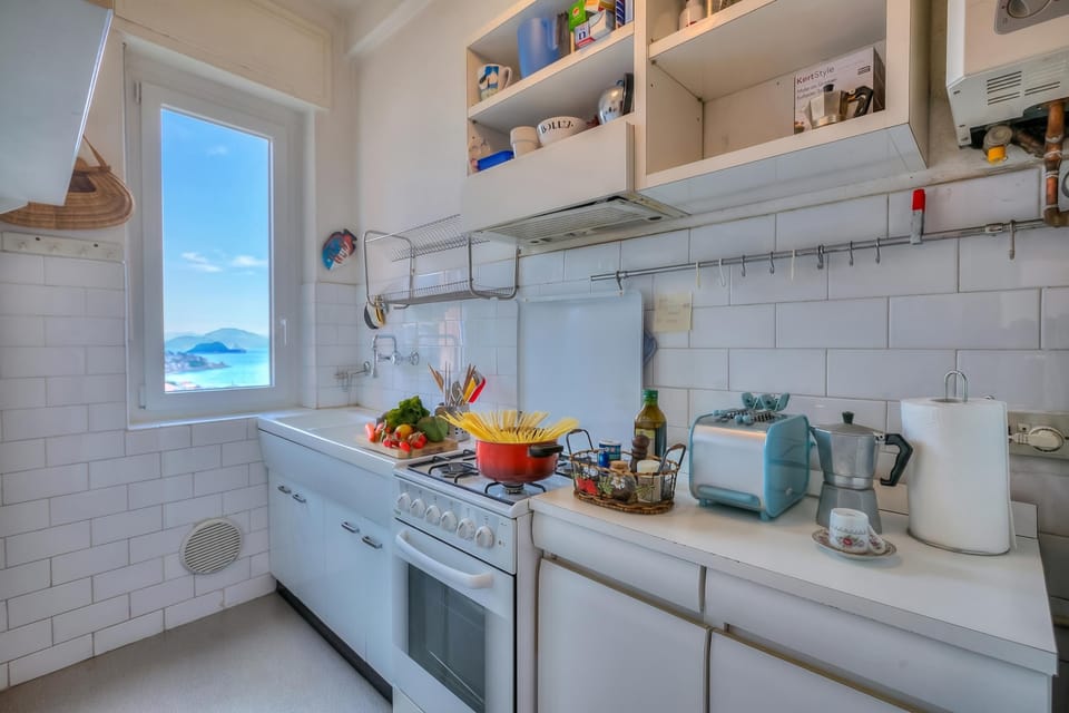 Standard Apartment, Multiple Bedrooms (Simply Romantic Sea View) | Private kitchen | Fridge, oven, stovetop, coffee/tea maker