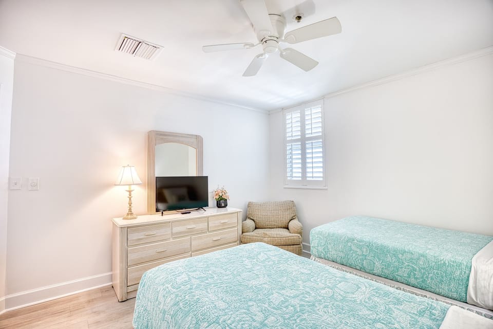 Bedroom Two: Two Twin sized beds