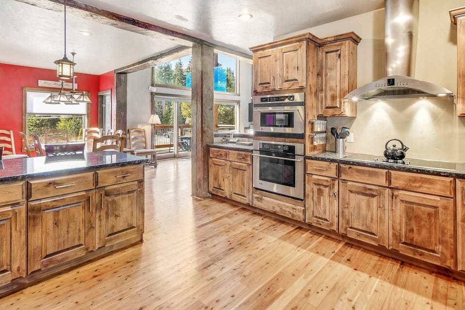 The inviting kitchen offers ample space & every home comfort