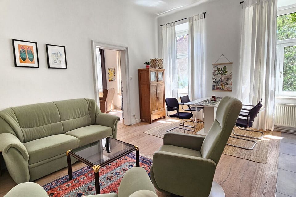 Apartment, Courtyard View | Living area | 120-cm flat-screen TV with digital channels, offices