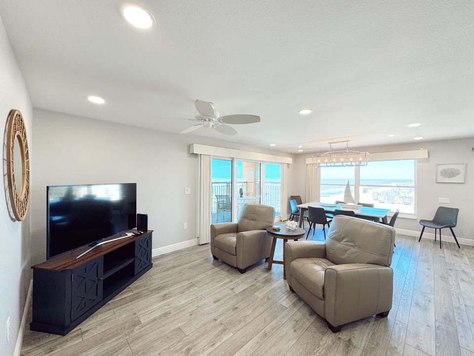 Living room with 2 chairs and couch(not pictured)