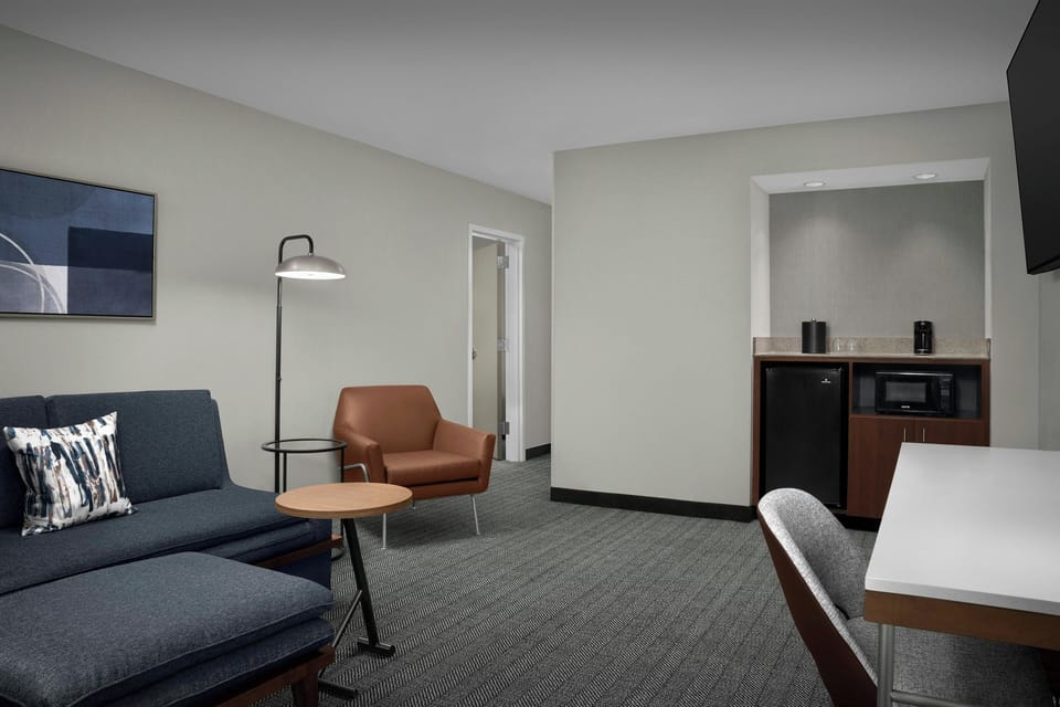 Premium bedding, down comforters, pillowtop beds, in-room safe